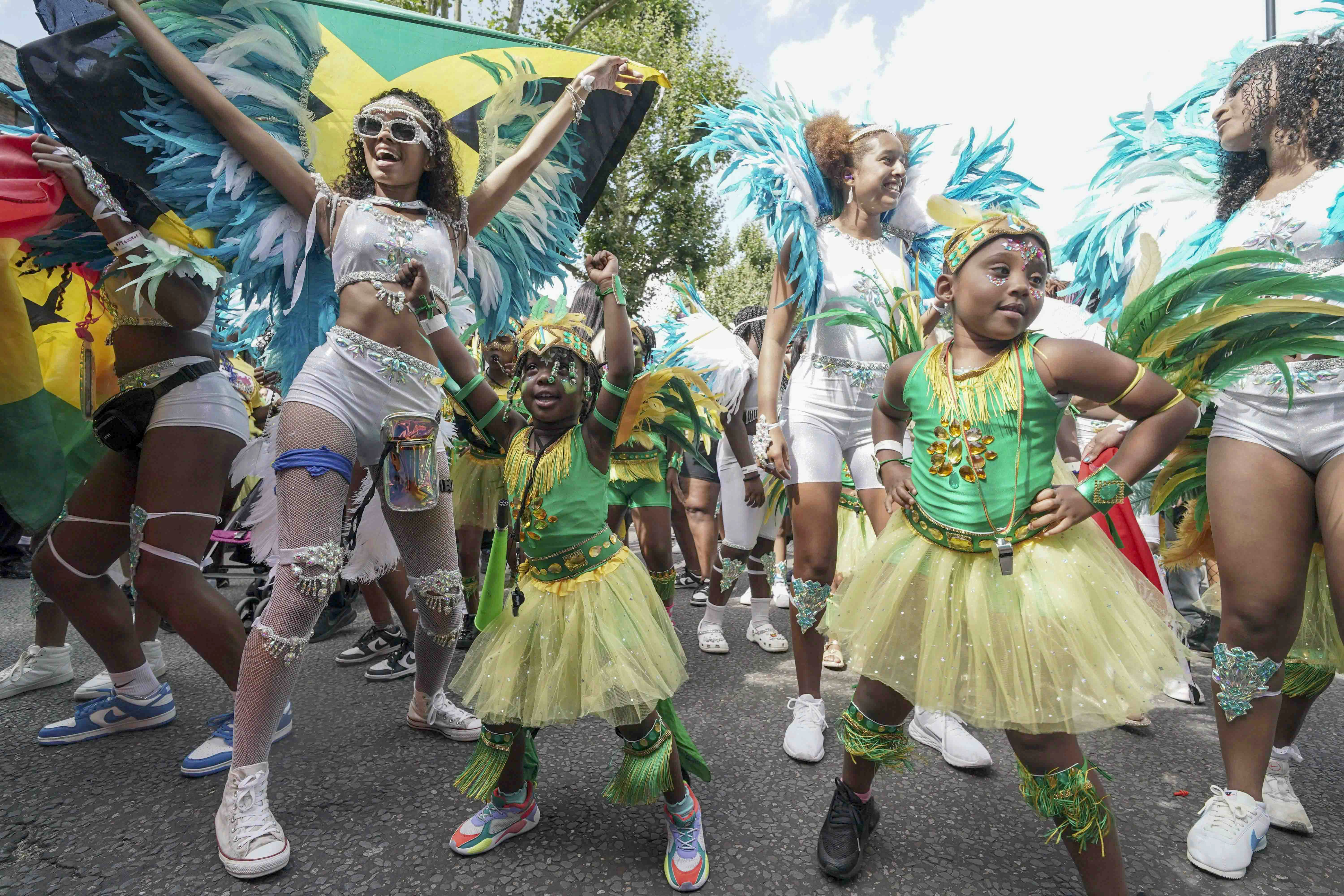 Children participate in the children’s day parade at Notting Hill Carnival