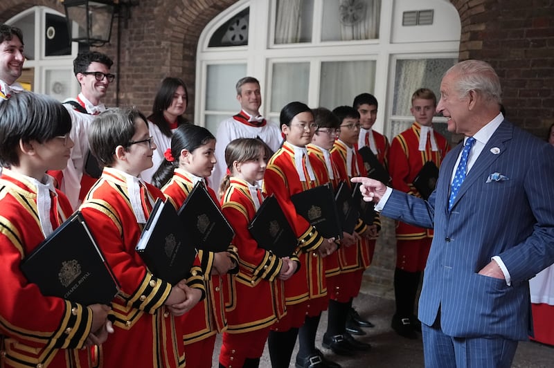 The King meeting choristers after a service celebrating 400 years of The Queen’s Chapel