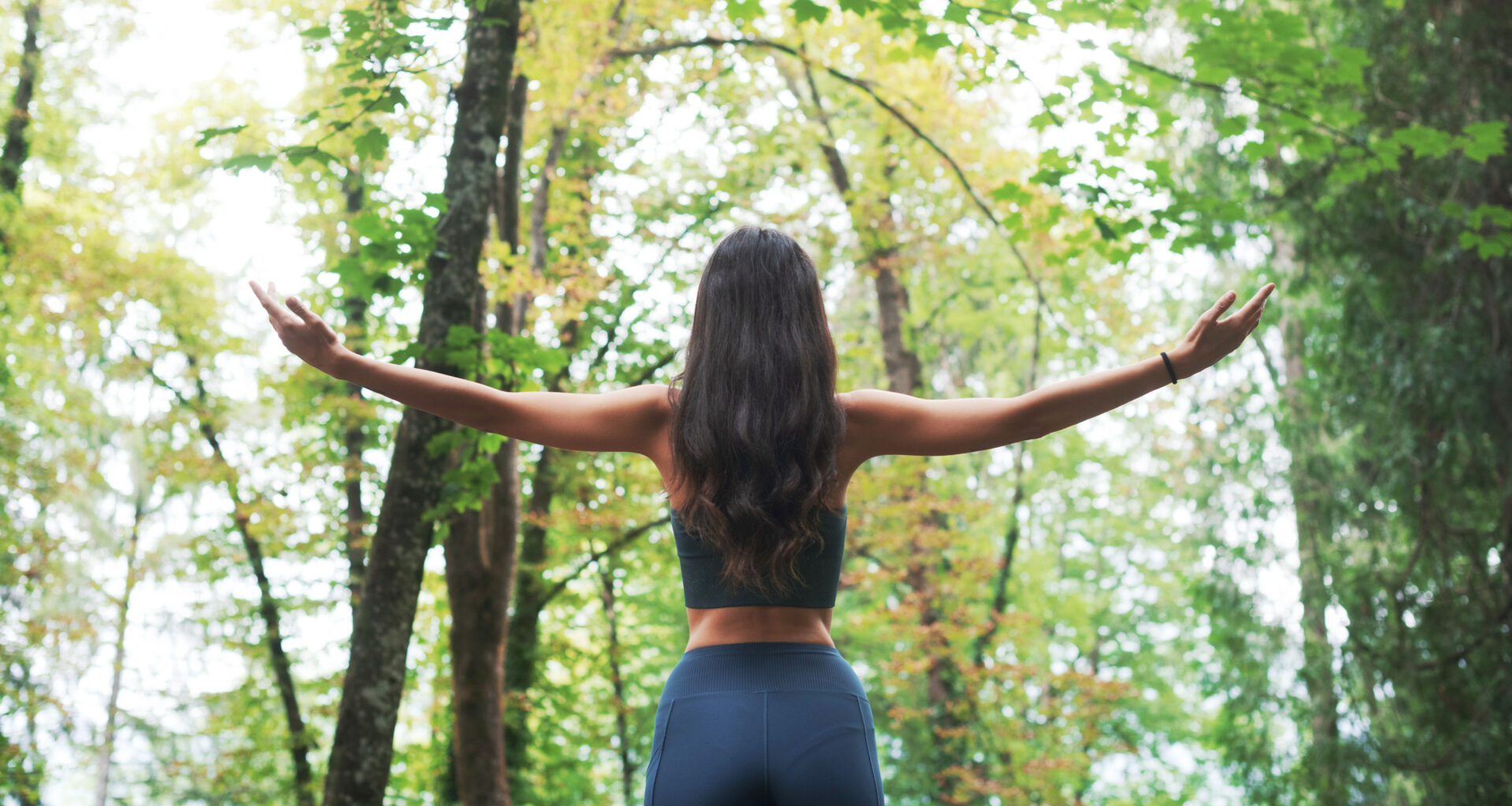 a photo of a woman walking in nature