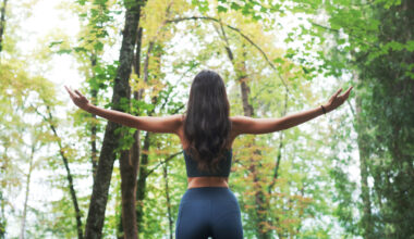 a photo of a woman walking in nature