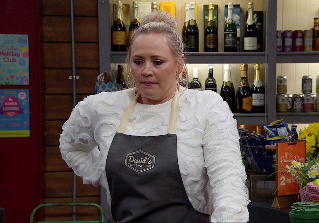 FROM ITV  STRICT EMBARGO - No Use Before Tuesday 1st April 2025  Emmerdale - Ep 10260  Monday 7th April 2025  Tracy Robinson [AMY WALSH] pockets some cash from the till, ashamed at what sheâ€™s been forced to do in order to survive.   Picture contact - David.crook@itv.com  Photographer - Mark Bruce  This photograph is (C) ITV and can only be reproduced for editorial purposes directly in connection with the programme or event mentioned above, or ITV plc. This photograph must not be manipulated [excluding basic cropping] in a manner which alters the visual appearance of the person photographed deemed detrimental or inappropriate by ITV plc Picture Desk. This photograph must not be syndicated to any other company, publication or website, or permanently archived, without the express written permission of ITV Picture Desk. Full Terms and conditions are available on the website www.itv.com/presscentre/itvpictures/terms