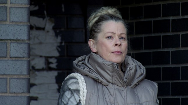 Bernie Winter standing in Weatherfield in Coronation Street