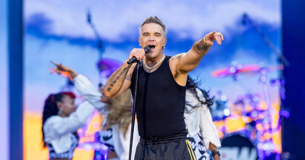 Iconic band reunite on stage after 25 years during Robbie Williams gig