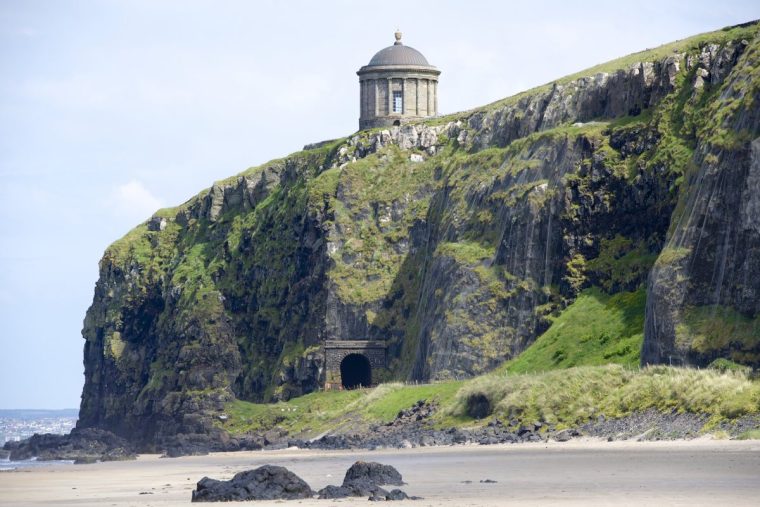 A photo of Mussenden Temple, show from below on Downhill Beach.