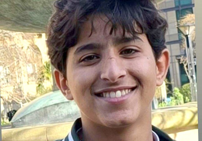 Abdul, 16, pictured for the first time smiling.