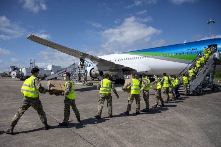 Supplies of PPE, like this load from China being unloaded in Cardiff in 2020, became difficult to obtain during the pandemic (Photo: Matthew Horwood / Getty Images)