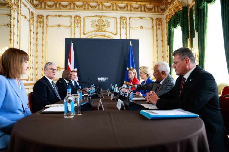 Rachel Reeves, UK chancellor of the exchequer, Keir Starmer, UK prime minister, David Lammy, UK foreign secretary, and Nick Thomas-Symonds, UK paymaster general, Kaja Kallas, vice president of the European Commission, Ursula von der Leyen, president of the European Commission, Antonio Costa, president of the European Council, and Maros Sefcovic, vice president of the European Commission, left to right, during a plenary session at the UK/EU summit at Lancaster House in London, UK, on Monday, May 19, 2025. Negotiators for the European Union and the UK have reached a deal to strengthen their post-Brexit relationship ahead of a summit on Monday, according to people familiar with the discussions and documents seen by Bloomberg. Photographer: Jason Alden/Bloomberg via Getty Images