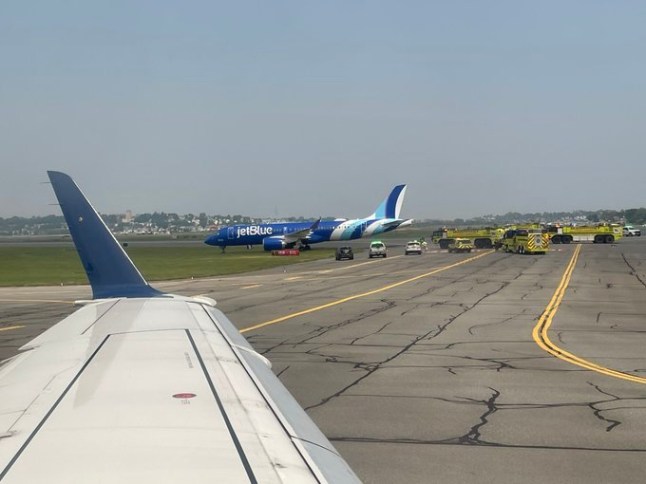 We?re on the taxiway stopped at Logan Airport and looks like a commercial flight (maybe jetblue?) landed at on the grass, and emergency vehicles raced to go meet the plane?hope everyone is okay!!