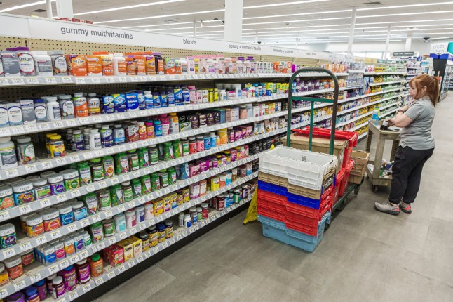 Miami Beach, Florida, Walgreens Pharmacy, OTC over the counter medications, restocking gummy multivitamins, Centrum, One a Day, Vitofusion. (Photo by: Jeffrey Greenberg/Universal Images Group via Getty Images)