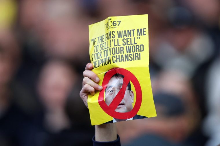 BLACKBURN, ENGLAND - APRIL 08: A fan of Sheffield Wednesday holds up a sign in protest of the owners during the Sky Bet Championship match between Blackburn Rovers FC and Sheffield Wednesday FC at Ewood Park on April 08, 2025 in Blackburn, England. (Photo by Matt McNulty/Getty Images)