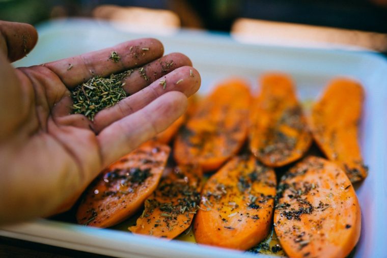 Preparing sweet potato for bbq.