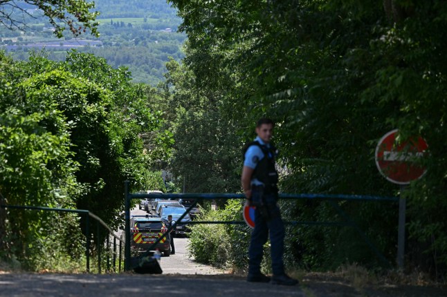 French gendarmes secure a perimeter near the site of a fatal shooting during a wedding party in Goult, in the southern French department of Vaucluse, on June 22, 2025. Masked gunmen opened fire on a wedding party, killing two, including the bride, and wounding three other attendees, as the newlyweds were leaving in the early hours of June 22. (Photo by Gabriel BOUYS / AFP) (Photo by GABRIEL BOUYS/AFP via Getty Images)