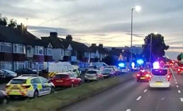 A murder investigation has been launched after an 18-year-old man died from gunshot wounds following a shooting on Great Cambridge Road in Enfield on Thursday night. Emergency services were called to the scene shortly after 8:45pm on 26 June, following reports of gunfire in the area. Officers from the Metropolitan Police and paramedics from the London Ambulance Service found the teenager critically injured. Despite immediate medical attention and transfer to a nearby hospital, the victim tragically died from his injuries. His next of kin have been informed and are being supported by specialist family liaison officers. Police Appeal & Community Support Detective Chief Superintendent Caroline Haines, borough commander for Enfield, expressed her condolences: ???I am saddened to hear that a young man lost his life last night. My thoughts are with his family and friends who will be processing this news today. We want to reassure the community that this appears to be an isolated incident and a thorough investigation is underway. An incident like this is deeply concerning, and we recognise the impact it can have on residents. Officers will remain in the area over the coming days ??? please speak to them if you have concerns.??? Investigation Update No arrests have been made at this early stage. A crime scene remains in place, with Great Cambridge Road closed while forensic and investigative work continues. Detectives from the Met???s Specialist Crime Command are leading the enquiry and have urged witnesses to come forward. Witness Appeal Police are appealing to anyone who was in the Great Cambridge Road area around 8:45pm and who may have seen or heard anything suspicious to come forward. Call 101 quoting CAD 8393/26JUNE To remain anonymous, contact Crimestoppers at 0800 555 111 or online at crimestoppers-uk.org Area Impact Local traffic is being diverted, and residents can expect to see a heightened police presence as officers carry out door-to-door enquiries