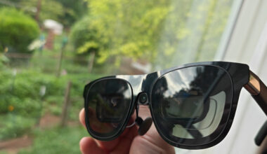 A pair of Xreal One smart glasses outfitted with an Xreal Eye camera and a set of HonsVR prescription lenses