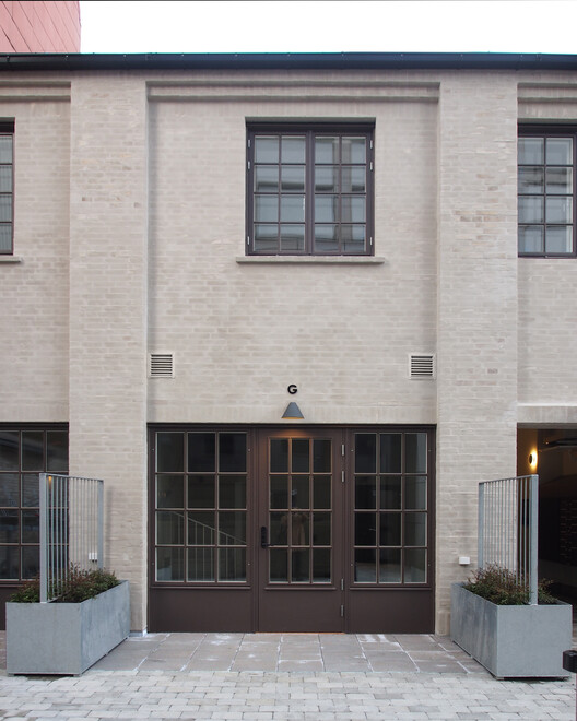 BRF Smedjan Courtyard Building and Gatehouse / Högberg Gillner Arkitektur - Exterior Photography, Door, Concrete