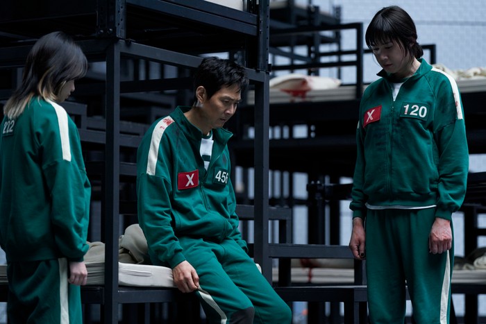 Jo Yu-ri as Jun-hee, Lee Jung-jae as Seong Gi-hun and Park Sung-hoon as Hyun-ju in Squid Game season 3