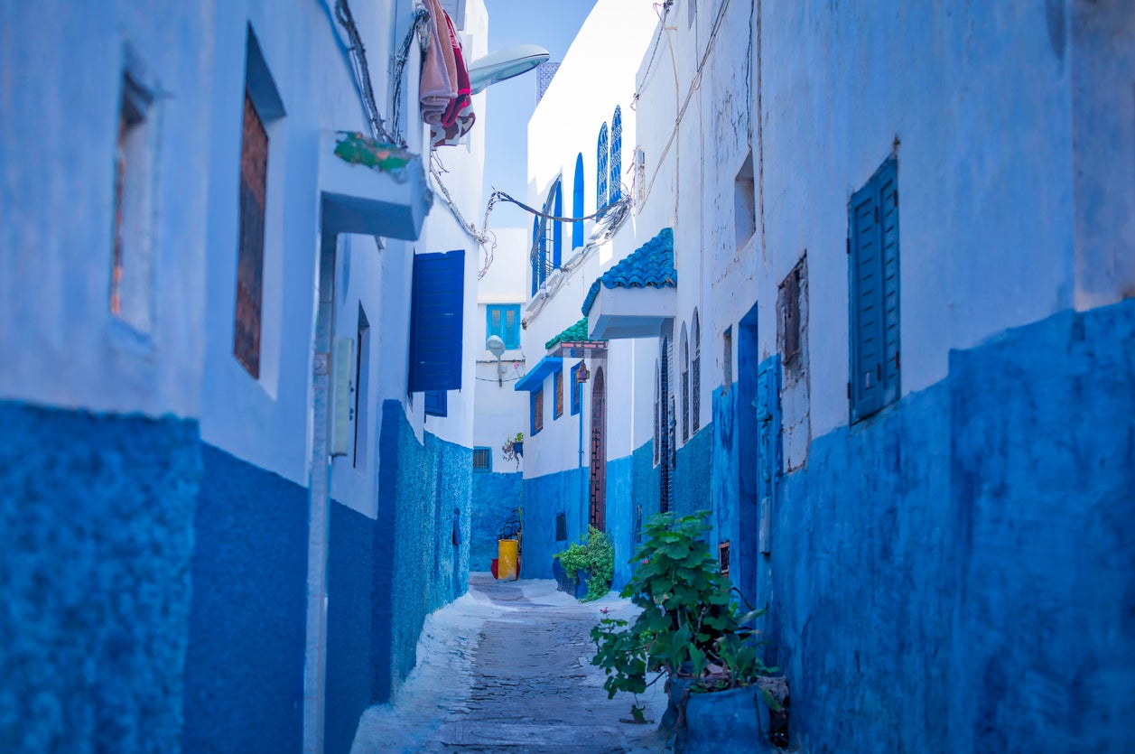 The narrow streets and the white and blue painted buildings of the Kasbah of the Udayas in Rabat, Morocco