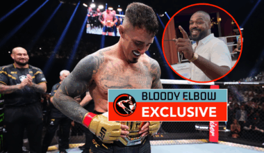 Main photo shows Tom Aspinall with the UFC belt. Bubble shows Jon Jones during an interview with Bloody Elbow. Overlay text reads: BLOODY ELBOW EXC...