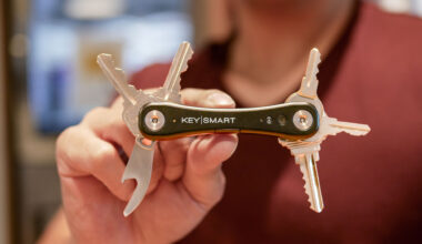KeySmart iPro smart key tracker held in hand.