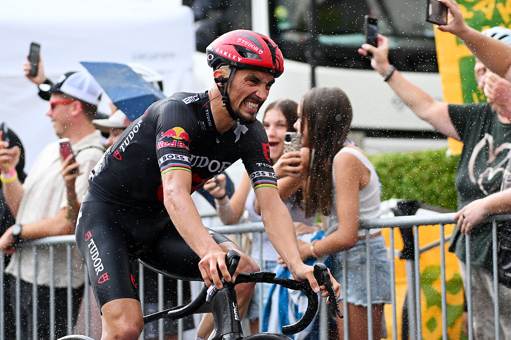 KUSNACHT, SWITZERLAND - JUNE 15: Julian Alaphilippe of France and Team Tudor Pro Cycling crosses the finish line during the 88th Tour de Suisse, Stage 1 a 129.4km at stage from Kusnacht to Kusnacht / #UCIWT / on June 15, 2025 in Kusnacht, Switzerland. (Photo by Tim de Waele/Getty Images)