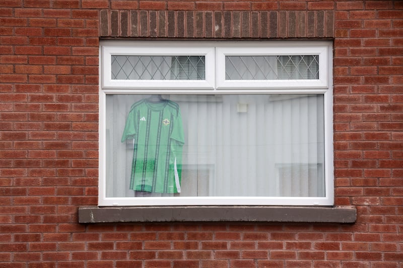 Flags and bunting and other british emblems in the windows of homes in Ballymena following anti-migrant intimidation earlier this month. PICTURE: MAL MCCANN