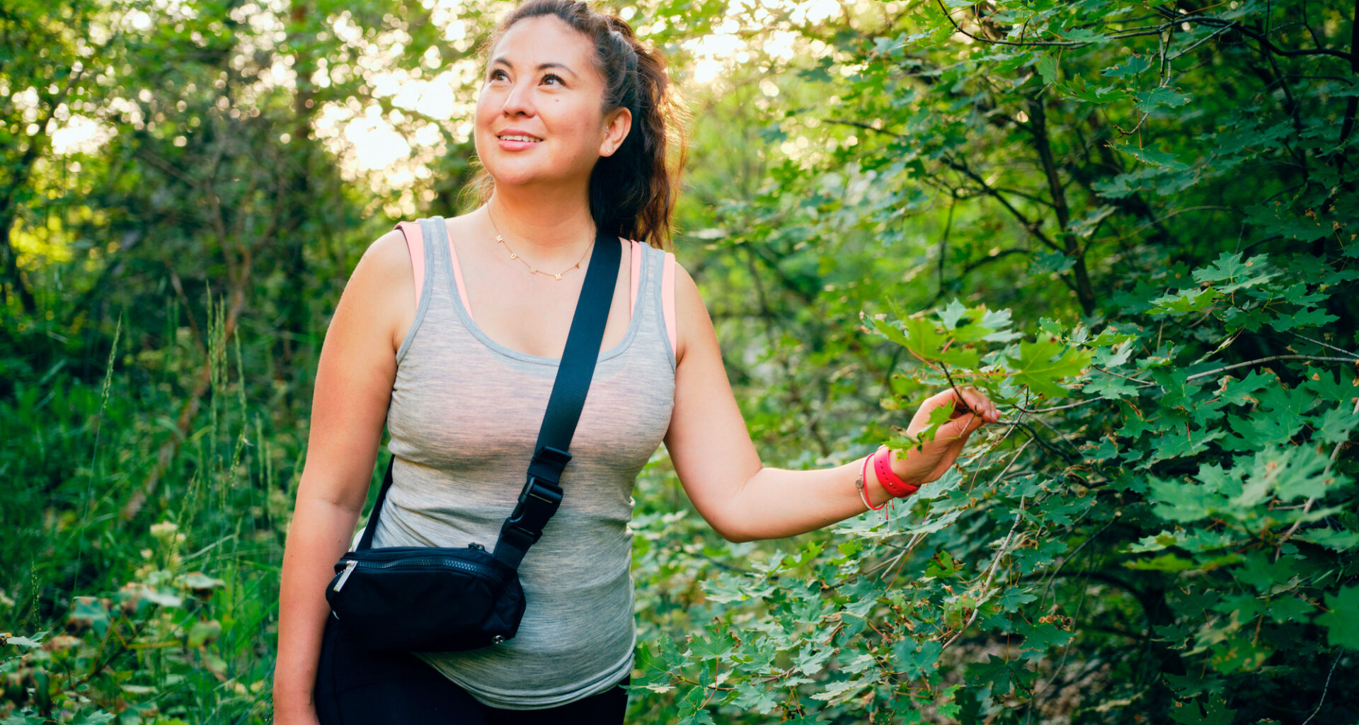 Woman walking in forest