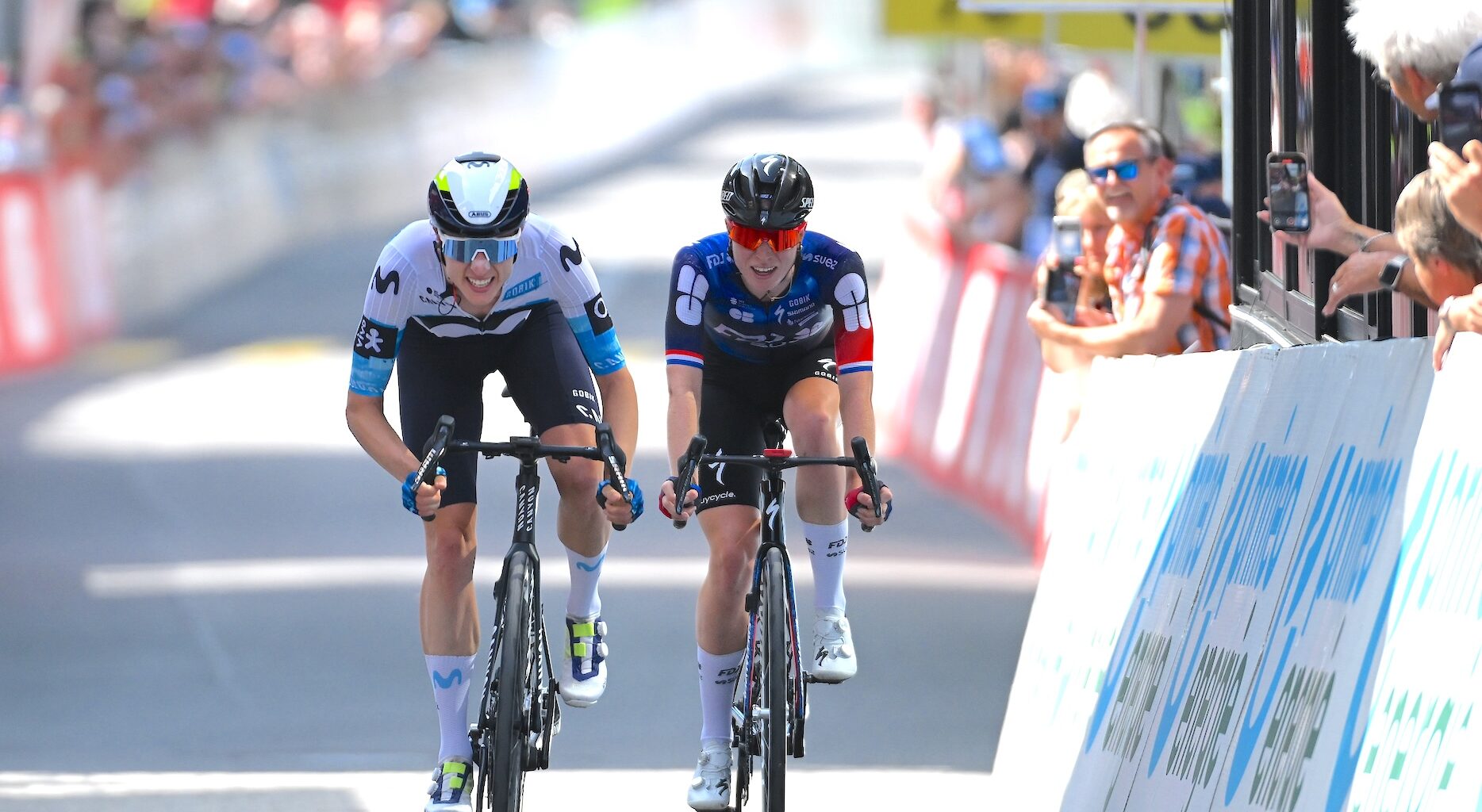 (L-R) Stage winner Marlen Reusser of Switzerland and Team Movistar and Demi Vollering of Netherlands and Team FDJ - SUEZ sprint at finish line during the 5th Tour de Suisse Women 2025, Stage 1 a 95.5km stage from Gstaad to Gstaad 1047m / #UCIWWT / on June 12, 2025 in Gstaad, Switzerland. (Photo by Tim de Waele/Getty Images)