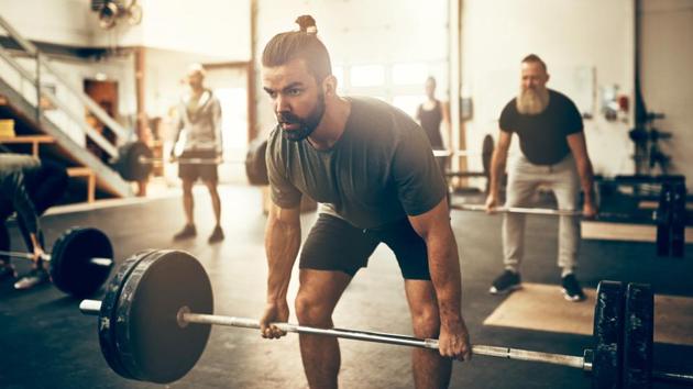 Just by lifting weights you’re not going to turn into a beefy, muscle-bound hulk.(Shutterstock)
