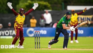 Ireland batter Harry Tector is bowled leg before wicket by West Indies bowler Roston Chase