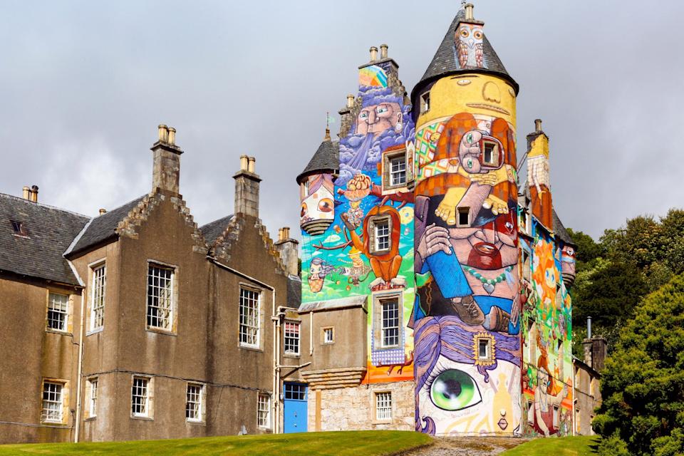 Kelburn Castle near Largs is a 16th century restored historic castle, painted with colourful graffiti