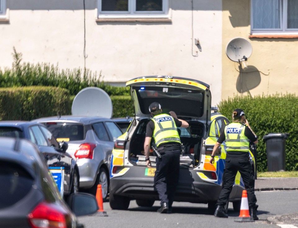 Police officers at a crime scene.