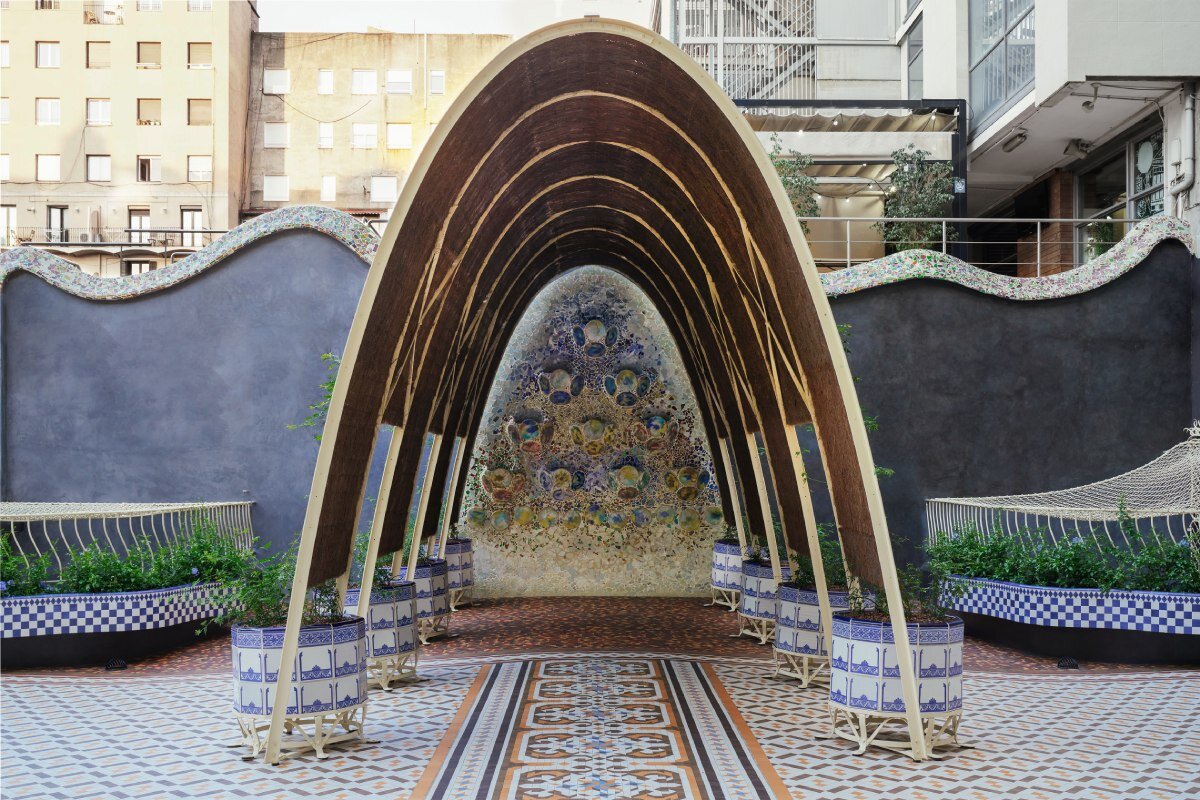mosaics, ironwork, and pergolas of gaudí's casa batlló in barcelona restored after a century