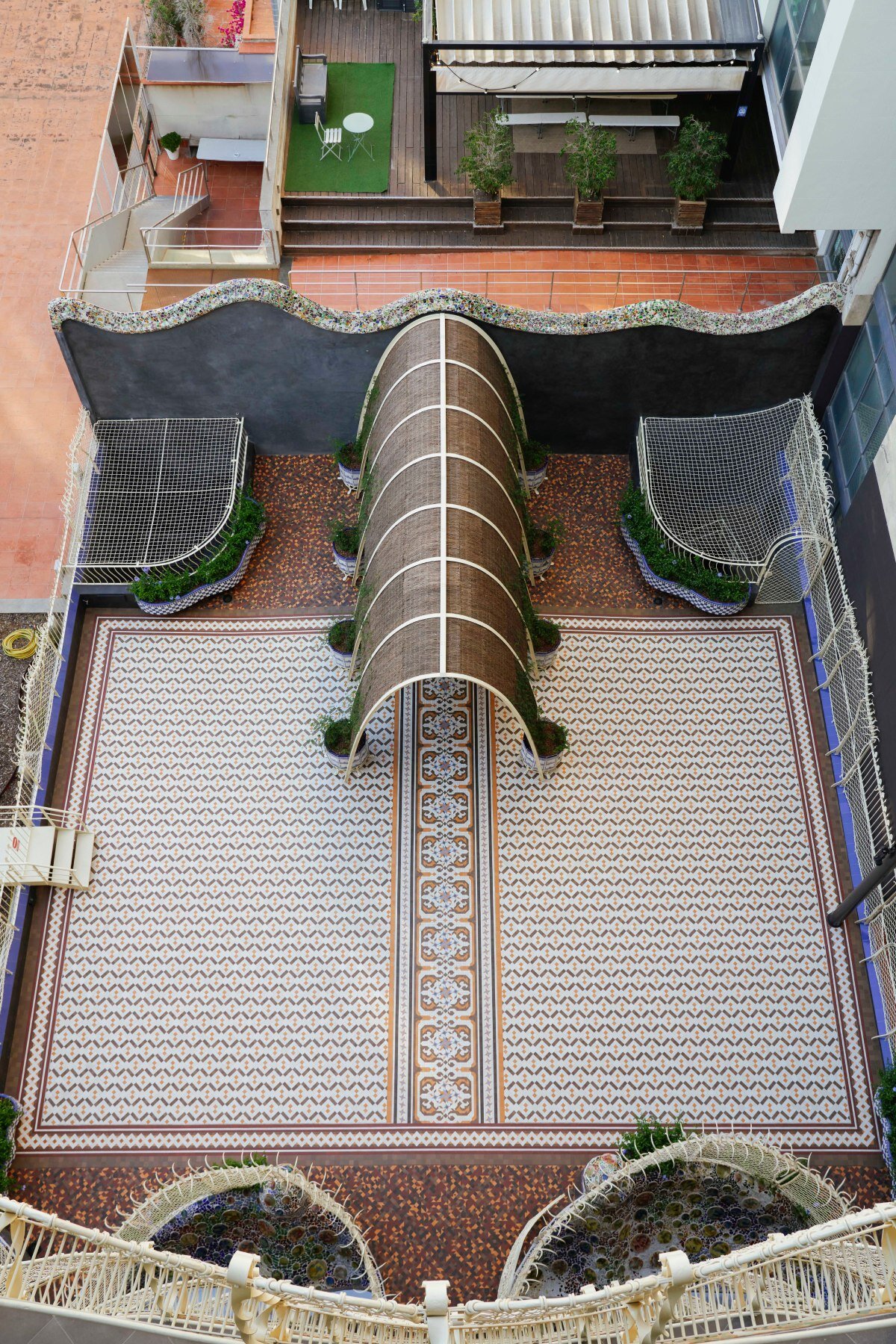 mosaics, ironwork, and pergolas of gaudí's casa batlló in barcelona restored after a century