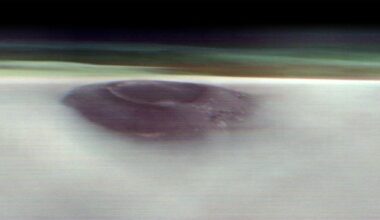 NASA Satellite Glimpses Giant Volcano Peeking Above The Clouds of Mars : ScienceAlert