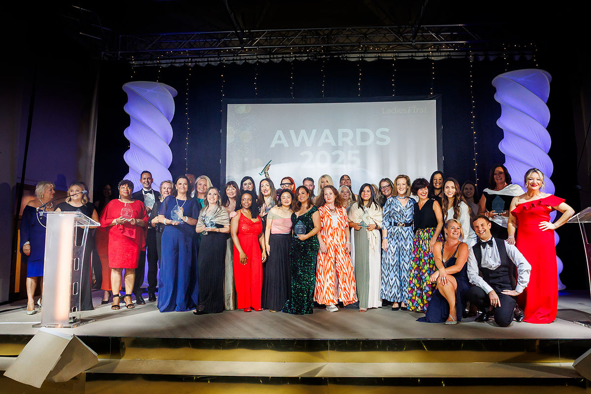 Siobhan Rowland and Hester Maclean of Edwards Wealth present the Excellence In Health & Wellbeing Award to Doreth Abrahams