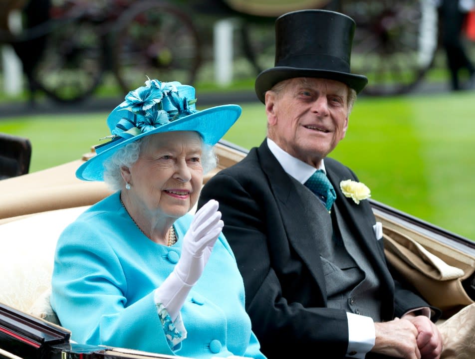 FILE – In this file photo dated Thursday, June, 19, 2014, Britain’s Queen Elizabeth II, and Prince Philip arrive by carriage in the parade ring on the third day of the Royal Ascot horse racing meeting, at Ascot, England. In the TV program ‘Prince Philip: The Royal Family Remembers’ released late Saturday Sept. 18, 2021, members of the royal family have spoken admiringly of the late Duke of Edinburgh’s barbecuing skills. (AP Photo/Alastair Grant, FILE)