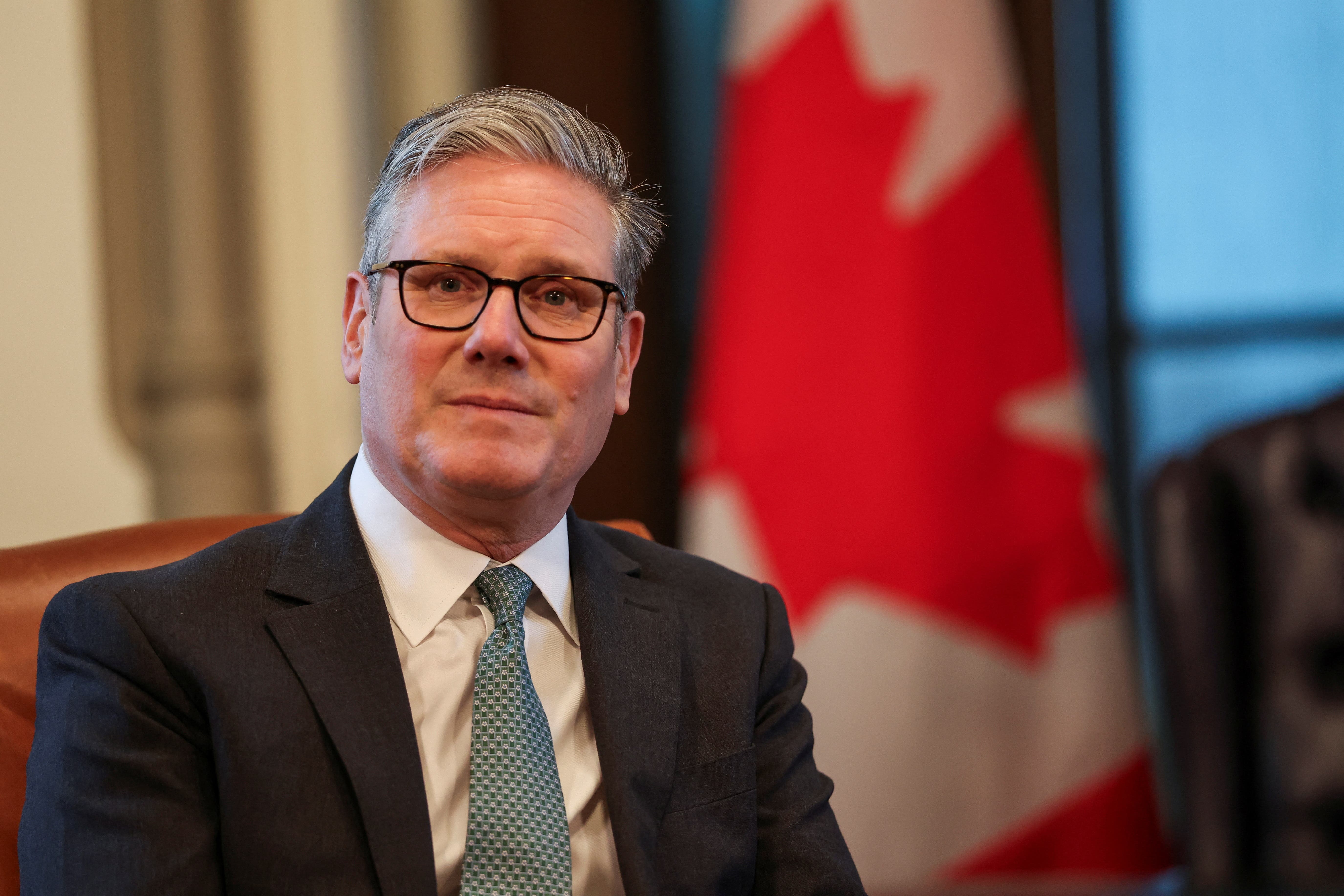 Sir Keir Starmer spoke to reporters while travelling to Canada for the G7 summit