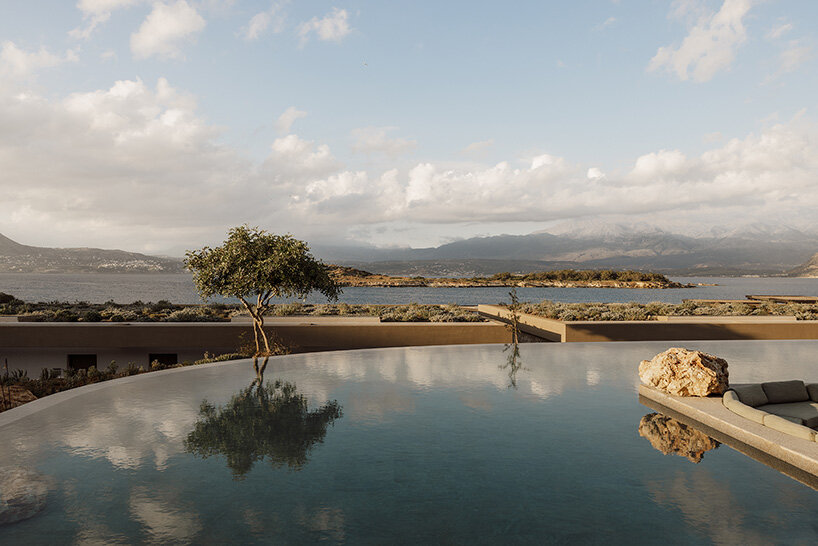 block722 sculpts JW marriott's crete resort into the landscape using stone from the site