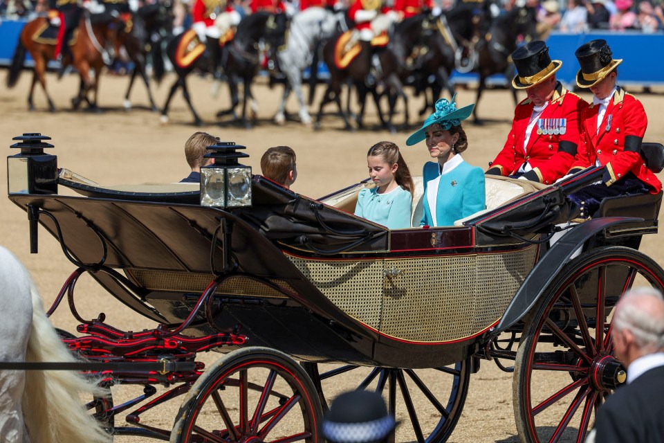 The Princess of Wales and her children in a carriage at the Trooping the Colour parade.
