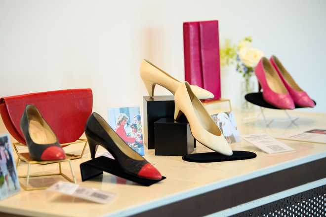 A selection of the late royal's shoes and handbags pictured at the Peninsula London ahead of the sale.