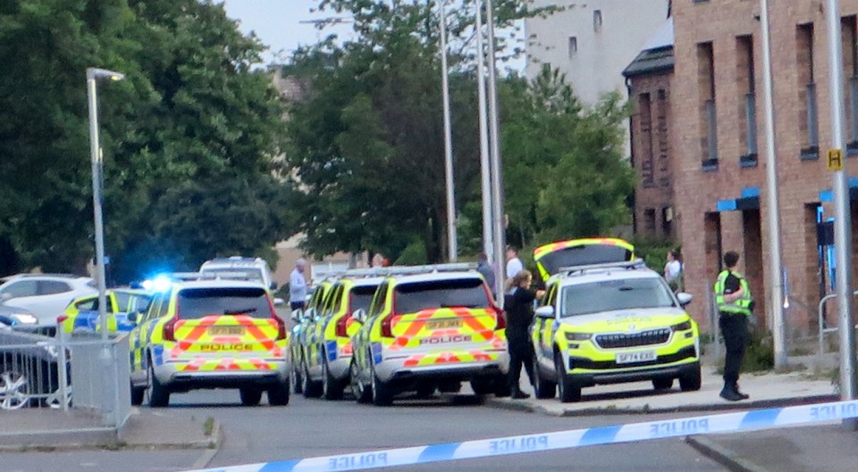Police cars at a crime scene in Pennywell Gardens, Edinburgh.