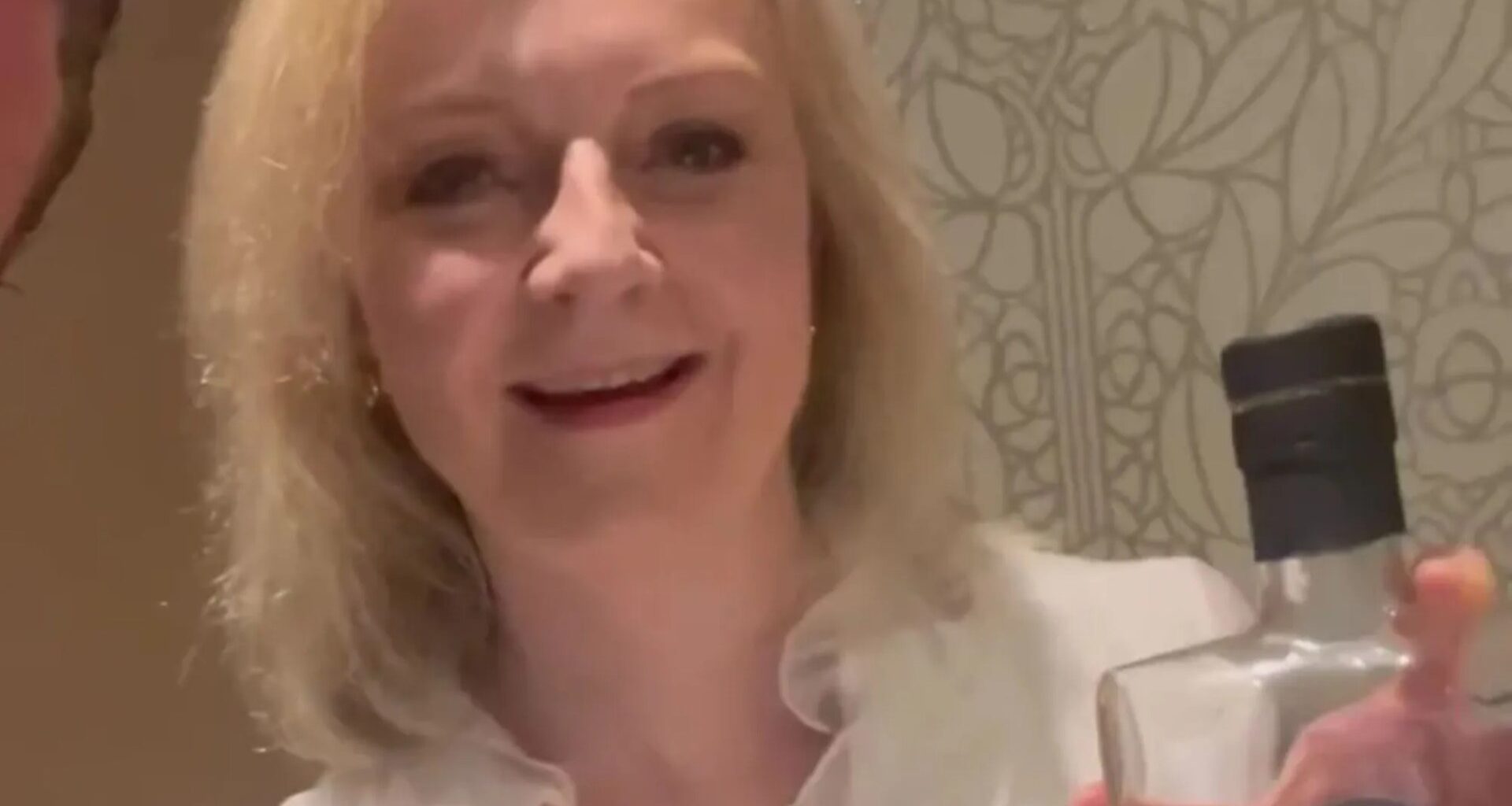 Former PM Liz Truss joins bare-knuckle fight thug who battered OAP to launch his whiskey - and even copies catchphrase