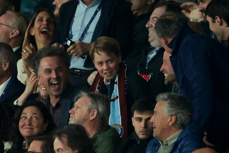 Prince George and Prince William in the stands at an Aston Villa match in Paris