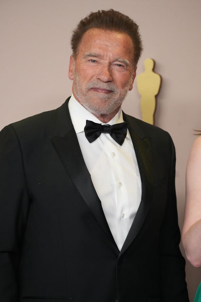 Arnold Schwarzenegger in a black tie 
