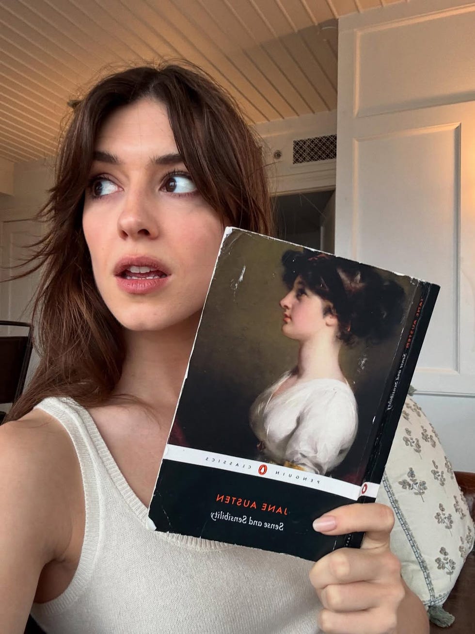 daisy edgar jones selfie with a sense and sensibility book by jane austin