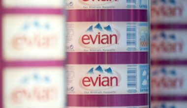 The logo of Evian mineral water is pictured on labels on the production line of its factory in Evian-les-Bains, eastern France in 2012 (MIGUEL MEDINA)