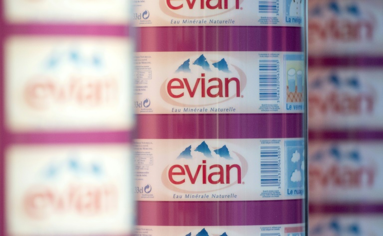 The logo of Evian mineral water is pictured on labels on the production line of its factory in Evian-les-Bains, eastern France in 2012 (MIGUEL MEDINA)