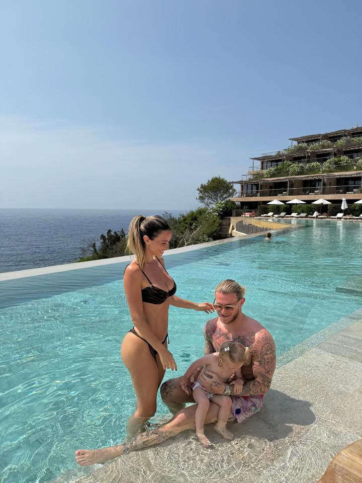 Family by a resort pool.