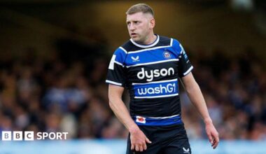 Finn Russell standing on the pitch during a match