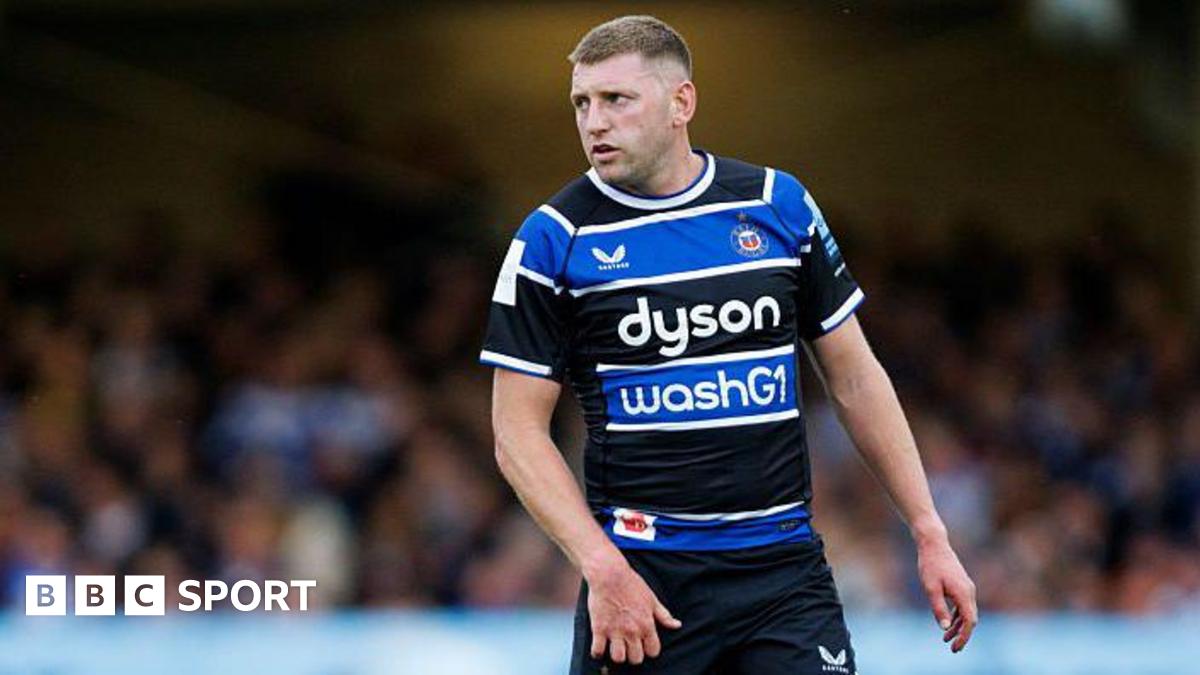 Finn Russell standing on the pitch during a match